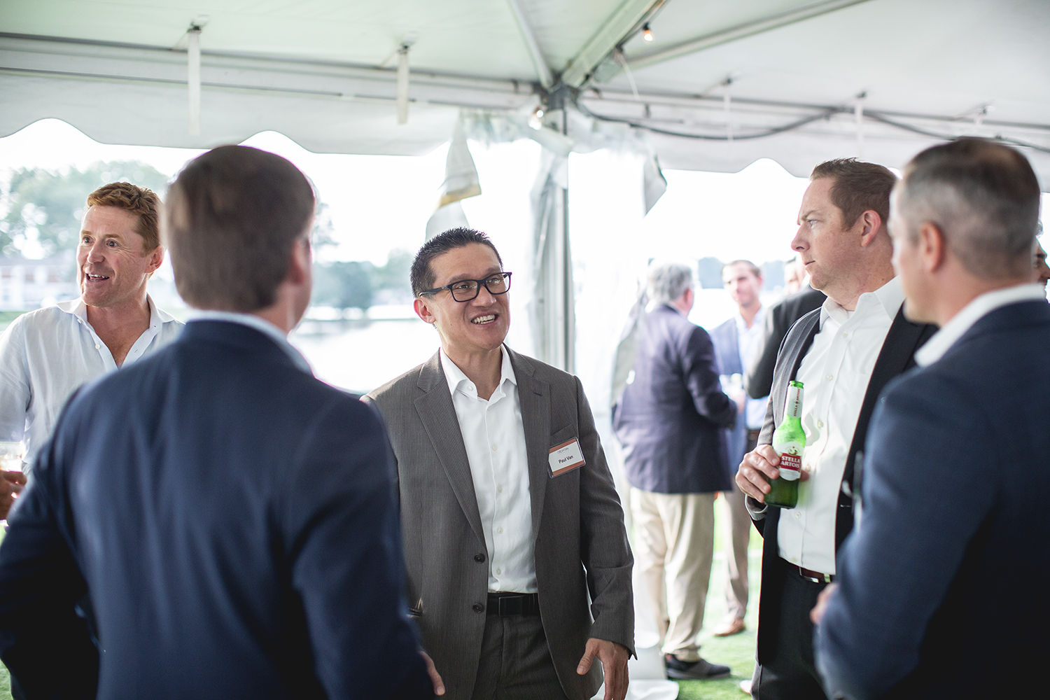 CEO Paul Van mingles at Croatan's second annual investor appreciation event.